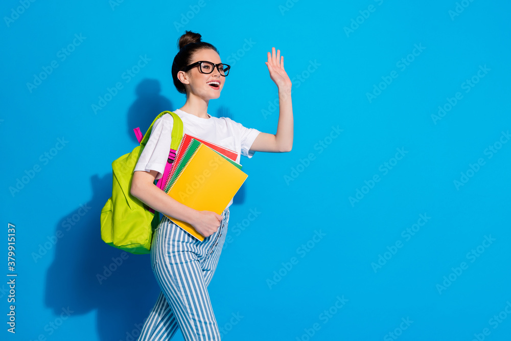Profile side photo of positive girl high school girl go classroom ...