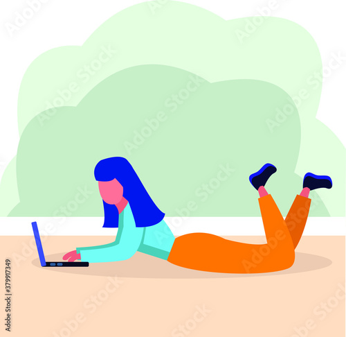 girl lying on the floor and working on a laptop, remote work