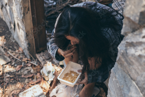 Wallpaper Mural poor people,homeless or beggar begging for help sitting at dirty slum.concept for poverty hunger,human rights,donate and charity for underprivileged children in third world Torontodigital.ca