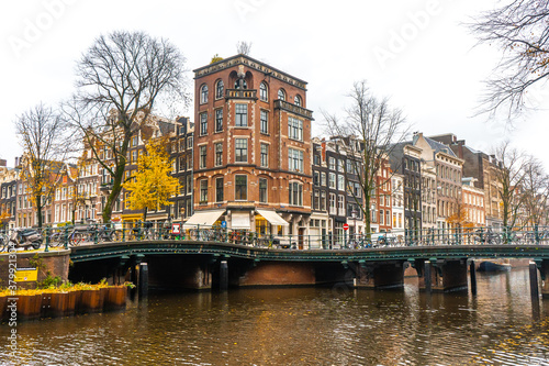 Beautiful buildings and the bridges around canal in the center of Amsterdam