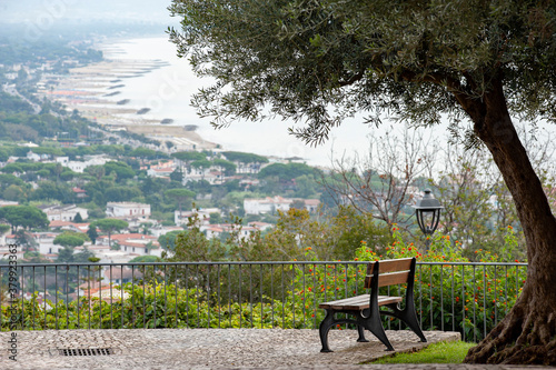 Panoramic terrace on the top hill of San Felice Circeo, Latina (Italy) . Beautiful blurred seascape in the background.. photo