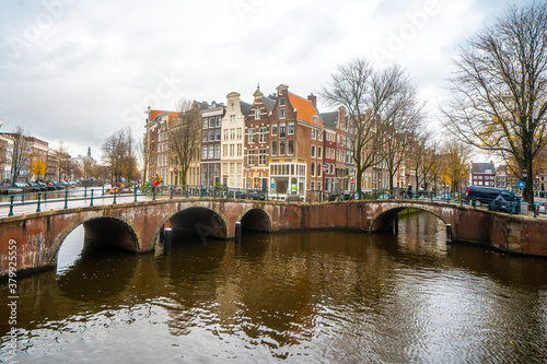 Beautiful bridges along the canal during Autumn in Amsterdam , Netherlands