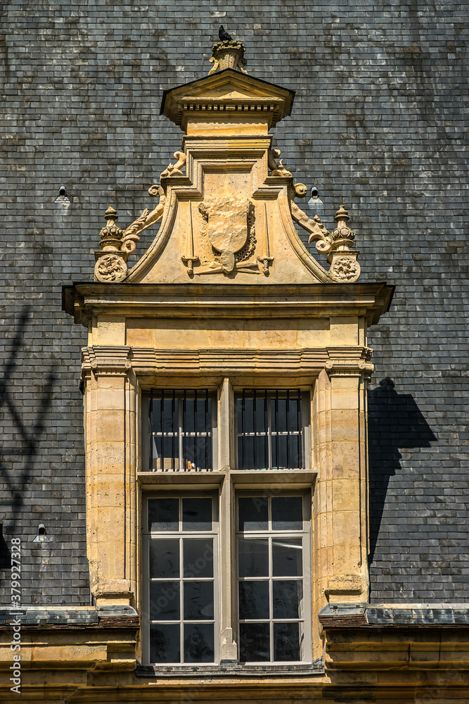 Architectural fragments of Cheteau Ecouen - historical chateau in city of Ecouen, north of Paris, France. Chateau built in 1538 – 1550.