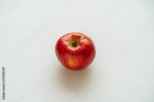 Red apple on a light background