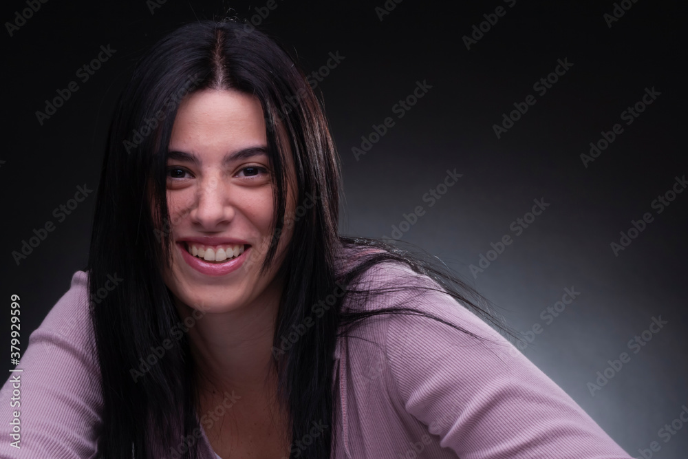 beautiful brunette woman smiling, studio light, neutral background beautiful brunette woman smiling, studio light, neutral background