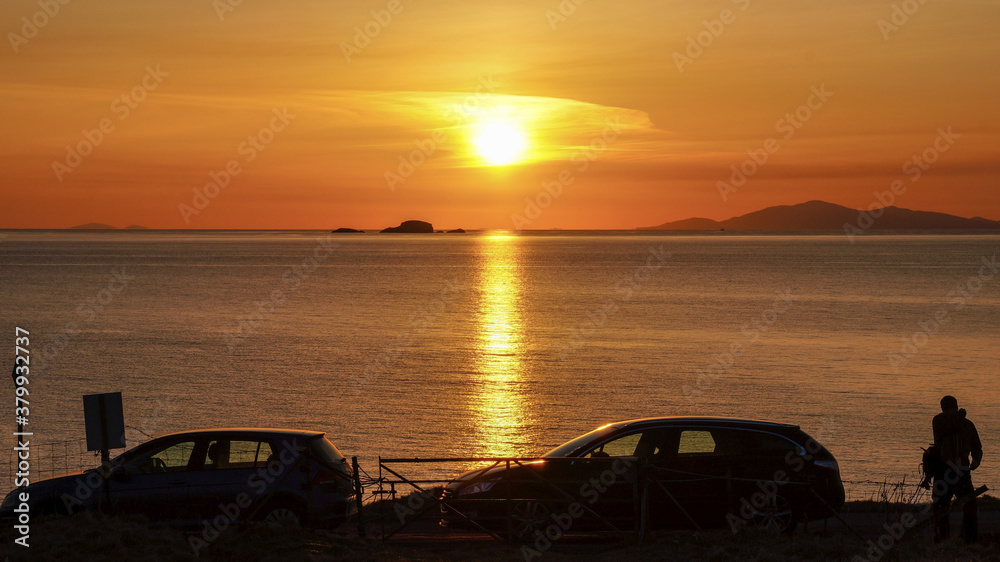 Sunset over the ocean at the Isle of Skye in Northern Scotland, United Kingdom. Sunset over the ocean at the Isle of Skye in Northern Scotland, United Kingdom.