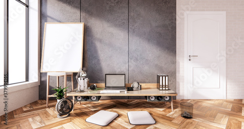 The interior Computer and office tools on mini desk in room concrete and white brick wall design. 3D rendering