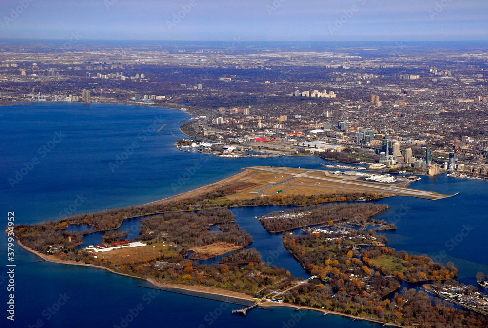 aerial view of the city of Toronto and the Billy  Bishop City centre airport in the foreground, Ontario Canada 