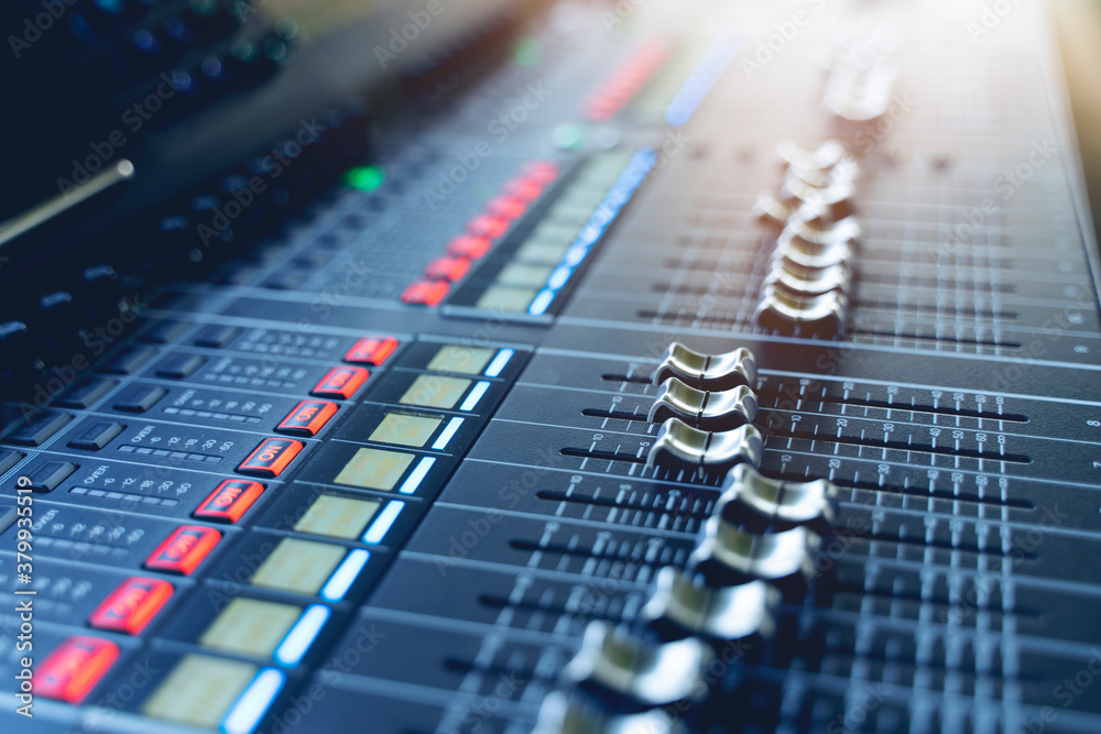 professional concert mixing console is equipped with high-precision and long-stroke faders. Close-up professional concert mixing console is equipped with high-precision and long-stroke faders. Close-up