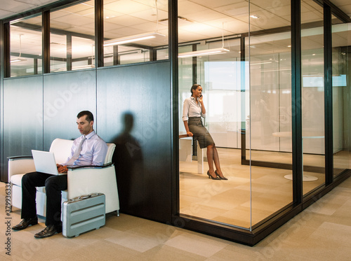 Co-workers in a modern office photo