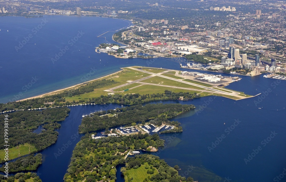 aerial view of the city of Toronto and the Billy Bishop City centre airport in the foreground, Ontario Canada 
