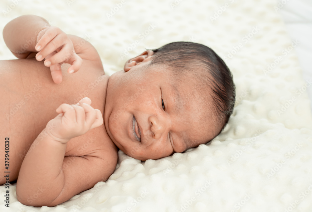 Portrait of african infant sleeping on bed Portrait of african infant sleeping on bed