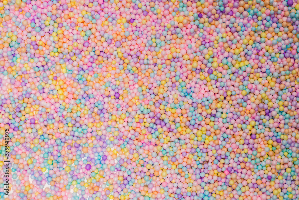 Purple, yellow, blue plastic balls. Purple, yellow, blue plastic balls.