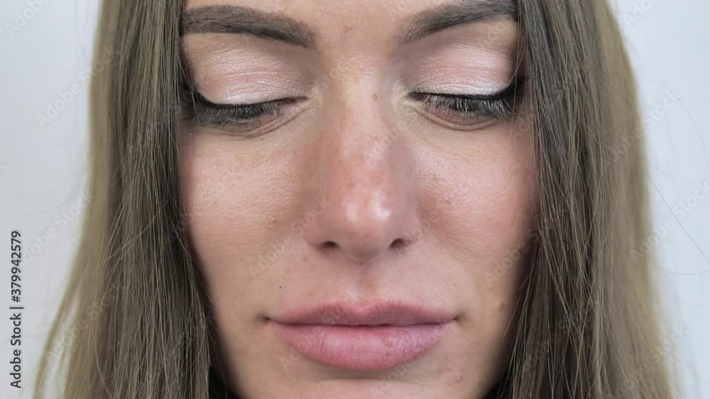 Extrume close-up portrait face. Female look at camera 4k Extrume close-up portrait face. Female look at camera 4k