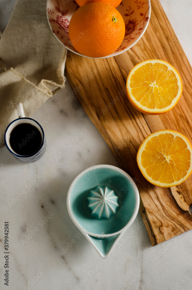 hand juicer and oranges hand juicer and oranges