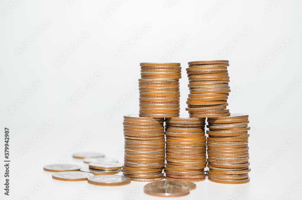 money savings plan concept. row of coins stack on white background. financial business banking for investment management success and growth. money savings plan concept. row of coins stack on white background. financial business banking for investment management success and growth.
