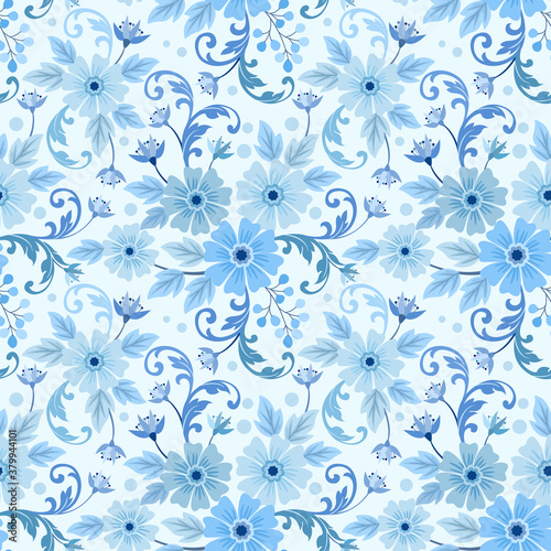  Seamless pattern with flowers and leaves on a blue background.