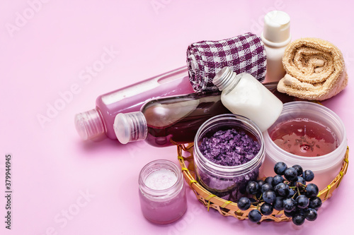 Natural spa accessories with ripe grapes