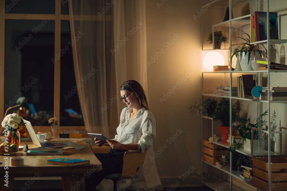 Businesswoman Working Late at Her Office Businesswoman Working Late at Her Office
