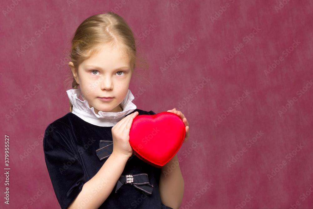 Little girl shows heart with her hands. Little girl shows heart with her hands.