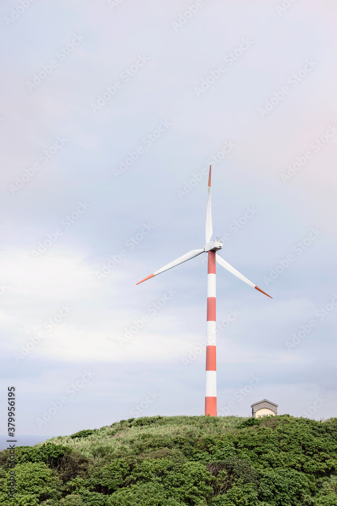 Power turbine against of cloudy sky Power turbine against of cloudy sky