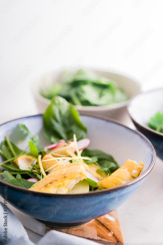 Smoked haddock,spinach and potato salad bowls. Smoked haddock,spinach and potato salad bowls.