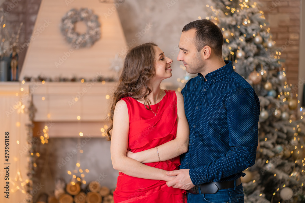 Cute married couple greet the christmas holidays Cute married couple greet the christmas holidays