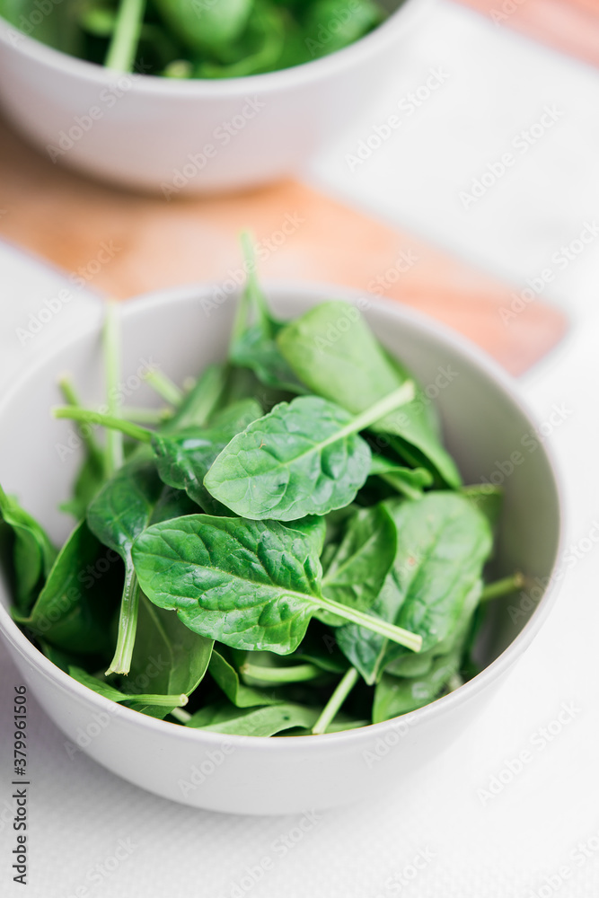 Fresh spinach on white background. Fresh spinach on white background.