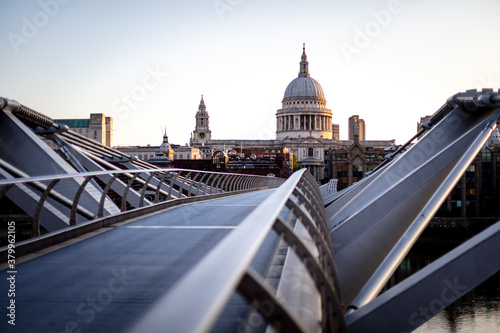 St Pauls Cathedral viewed over a empty Millennium Bridge, London photo