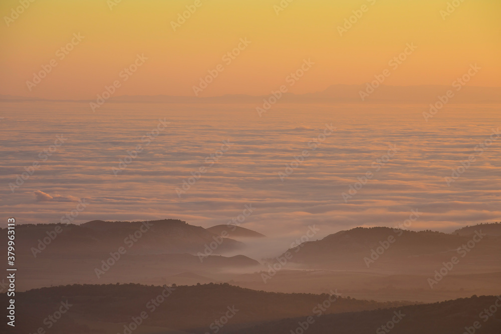 Landscape with mountains and sea of fog Landscape with mountains and sea of fog
