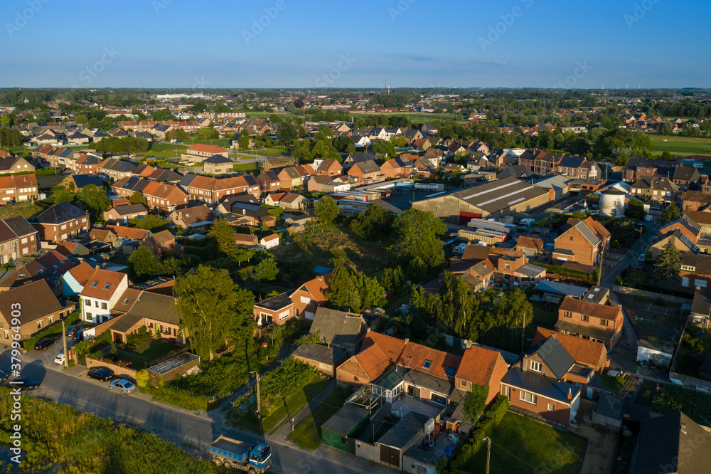 Baasrode, Belgium - June 26 2019: Aerial view of the Broekkouter neighbourhood of Baasrode, on a sunny evening