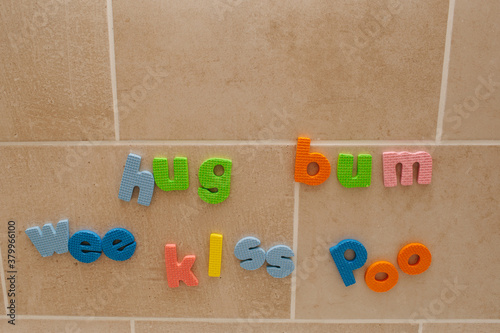 Hug, bum, wee, kiss, poo. photo