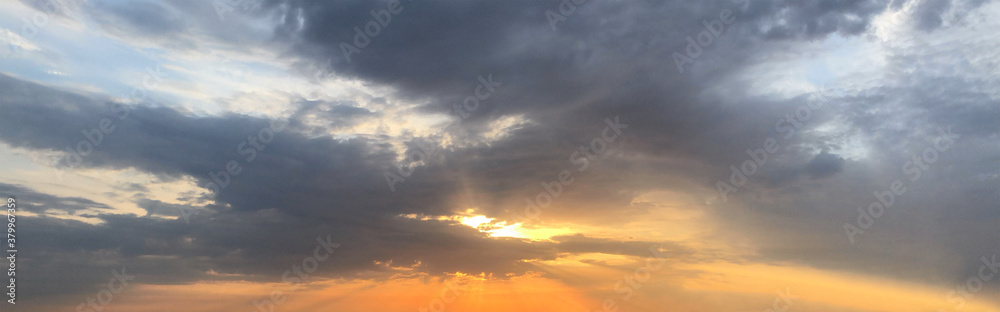 Sunset. Beautiful sun and sky with clouds, landscape panorama skyline background Sunset. Beautiful sun and sky with clouds, landscape panorama skyline background