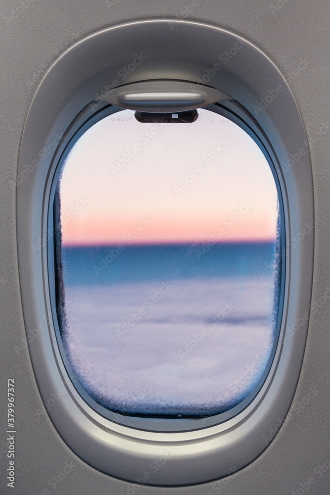 View through frozen airplane window View through frozen airplane window