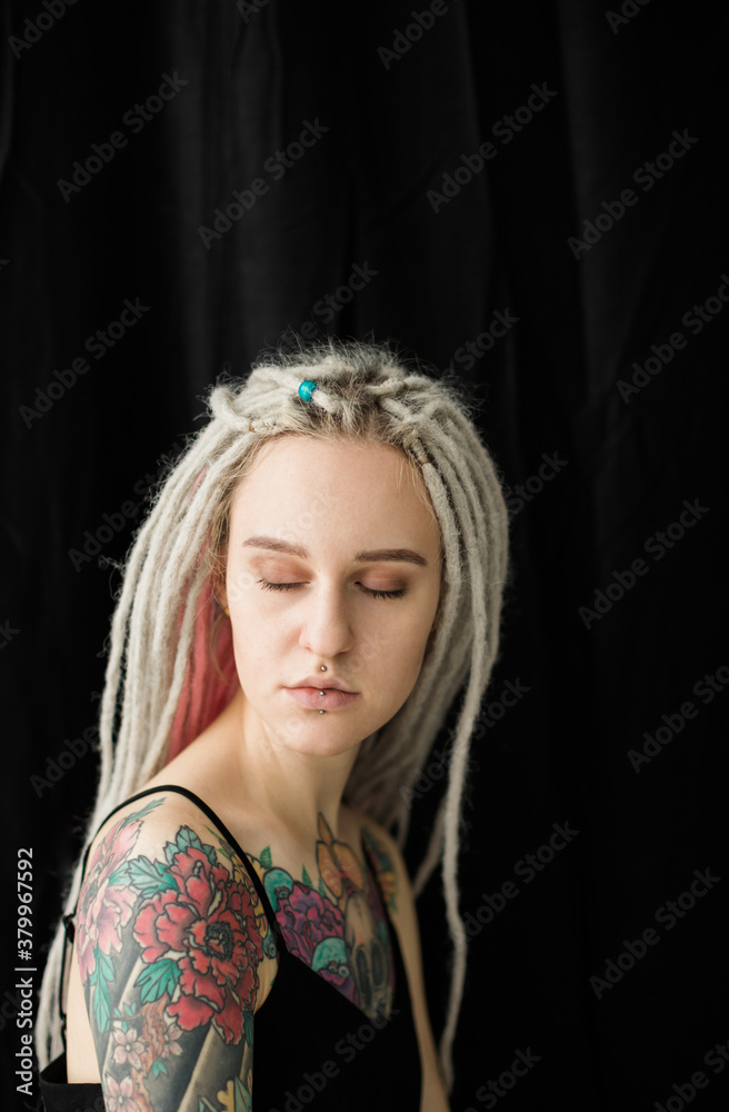 dreadlocked young woman dreaming