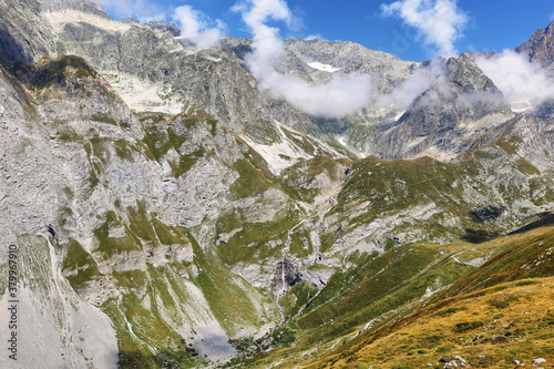 View of mountains and waterfall from Le Moriond in Vanoise national park  french alps  France