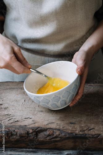 Wallpaper Mural Cook beating up eggs with fork Torontodigital.ca