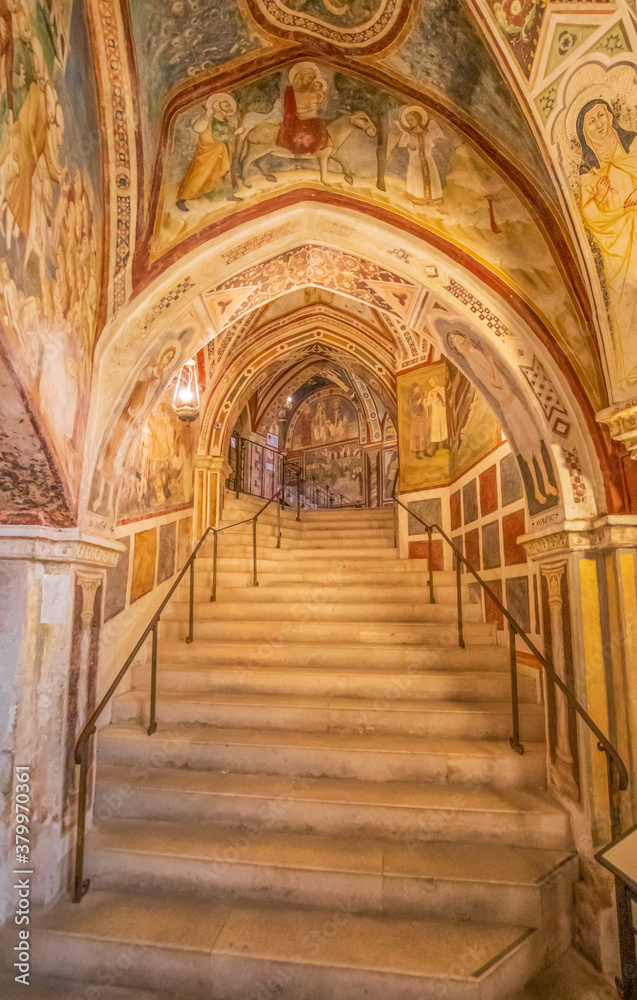 Obraz premium Subiaco, Italy - main sight of Subiaco and one of the most beautiful Benedictine monasteries in the World, the Sacro Speco Monastery displays amazing frescoes. Here in particular its interiors