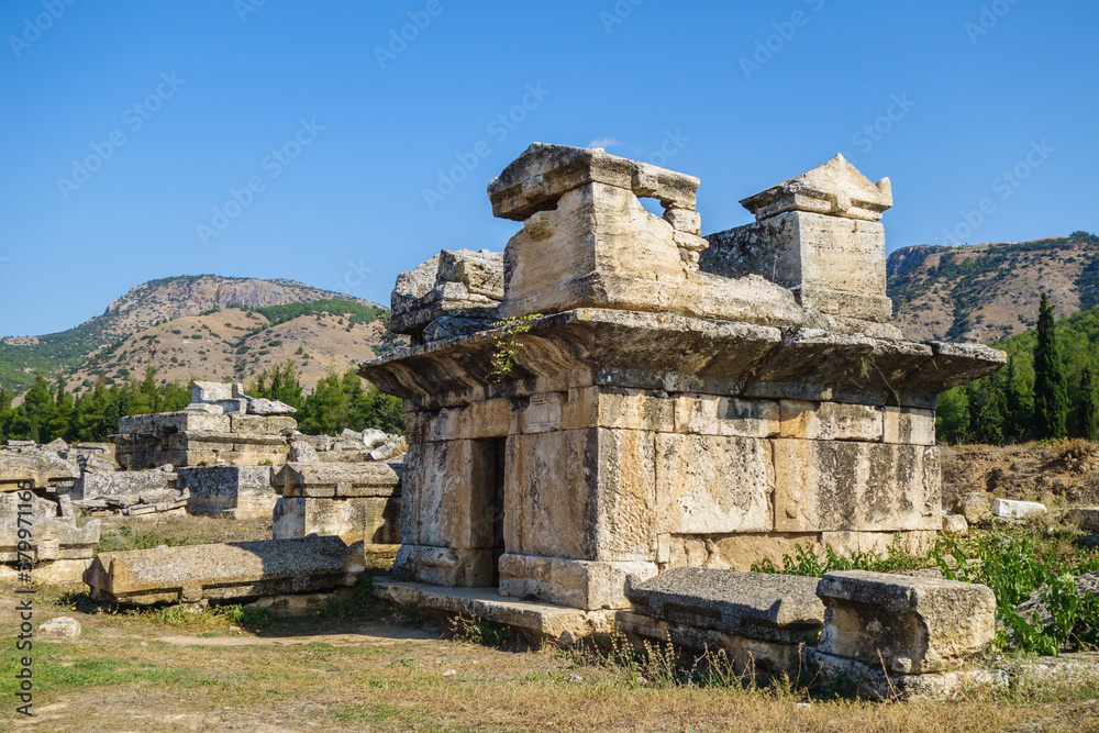 Ancient crypt of some noble family from antique city Hierapolis, Pamukkale, Turkey. Some sarcophagus located on roof as there's no place inside. All ancient city included in UNESCO World Heritage List