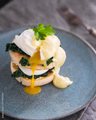 Breakfast muffin: Double poached egg,kale and hollandaise sauce. photo