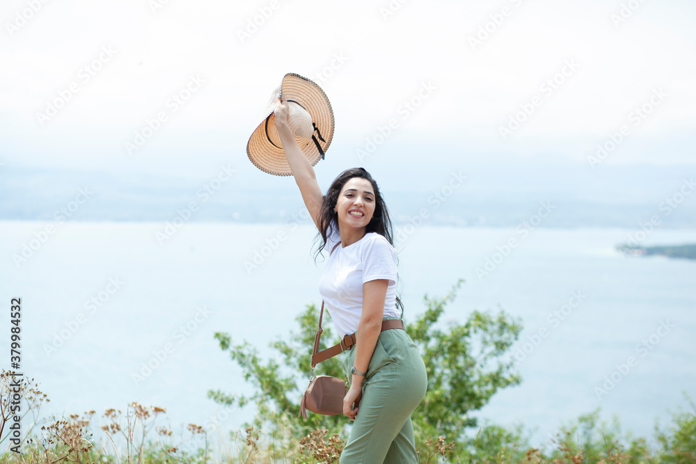 Fototapeta premium traveler woman in lake background