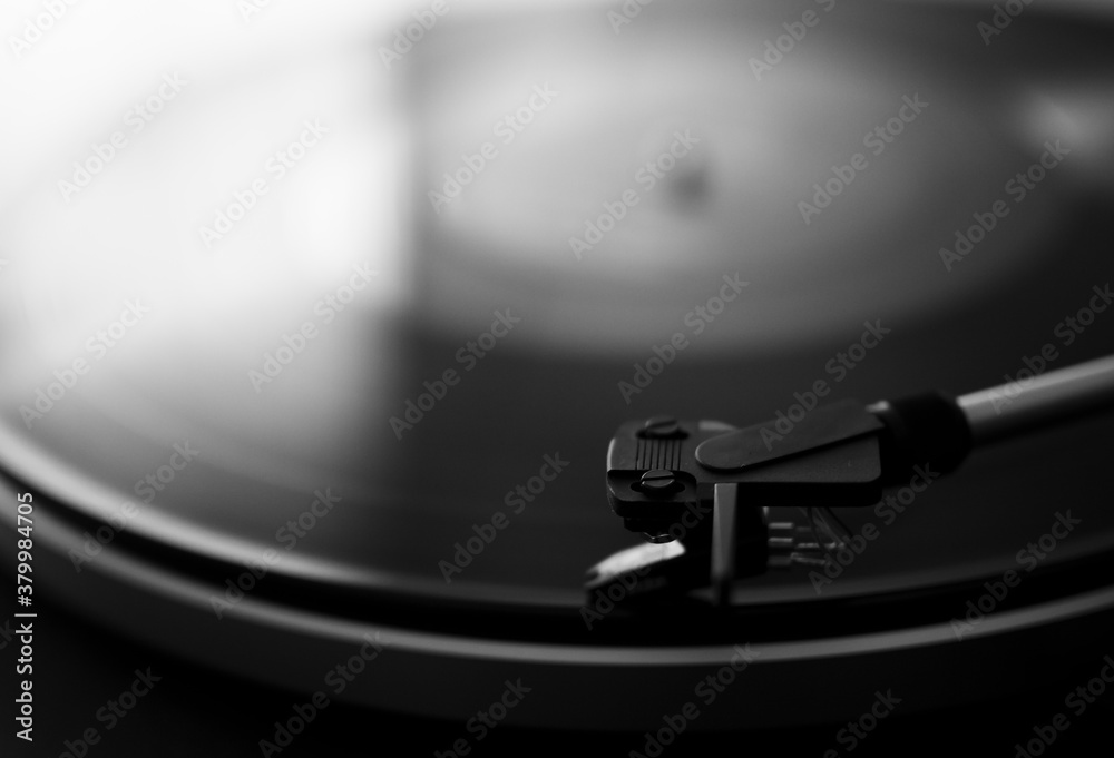 Detail of record player with spinning vinyl. Detail of record player with spinning vinyl.