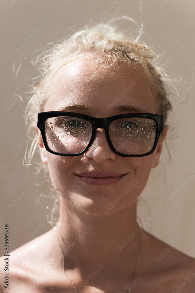 Woman in wet glasses Woman in wet glasses