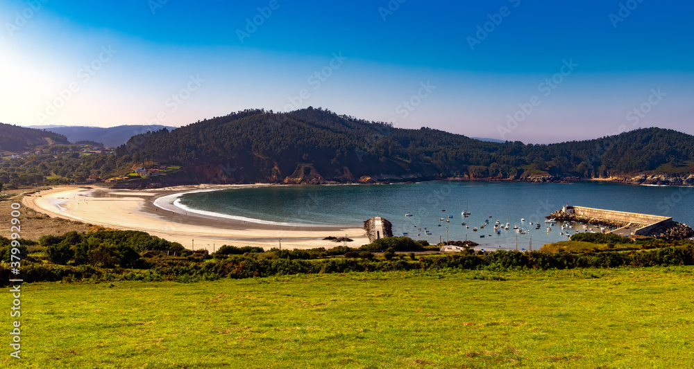 Fototapeta premium High angle view of Porto de Espasante beach and harbor in the Galicia region of Spain.