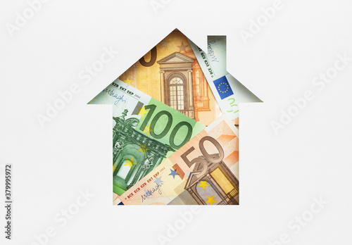 Euro banknotes in paper house symbol