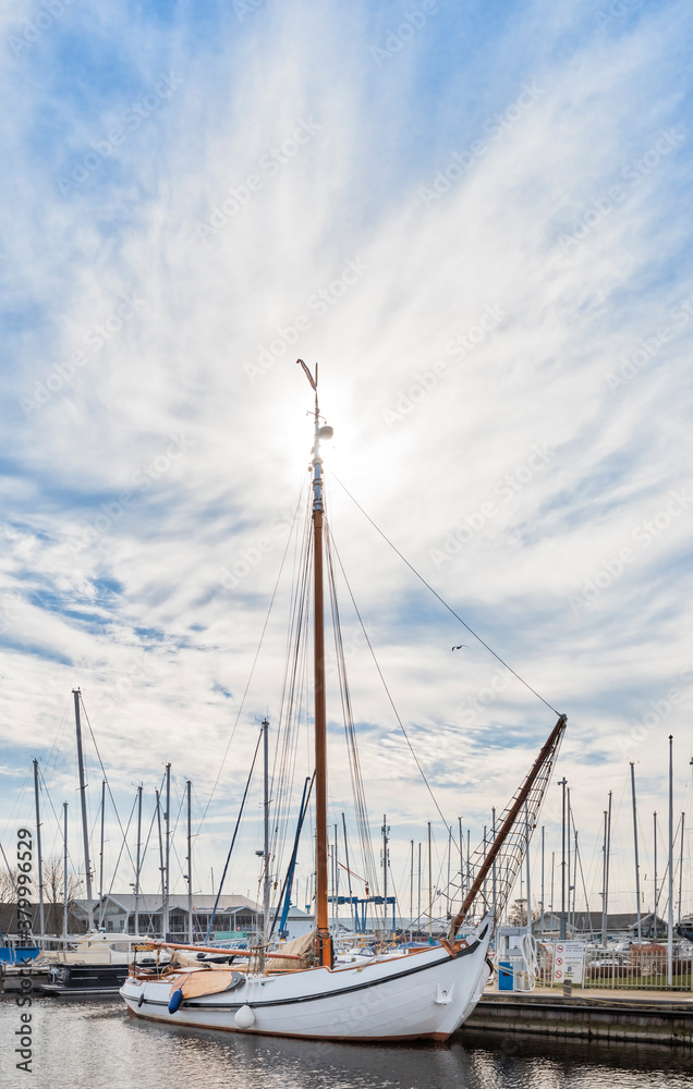 Flatboat and marina in Hindeloopen, Netherlands Flatboat and marina in Hindeloopen, Netherlands