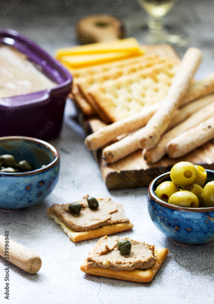 Chicken liver, onion and carrot paste, served with crackers, grissini, olives, capers and champagne. Chicken liver, onion and carrot paste, served with crackers, grissini, olives, capers and champagne.