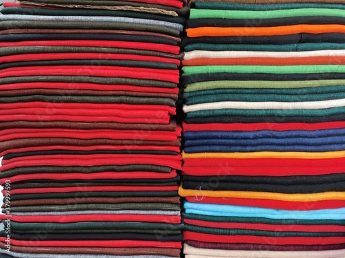 Multi-colored cloths stacked