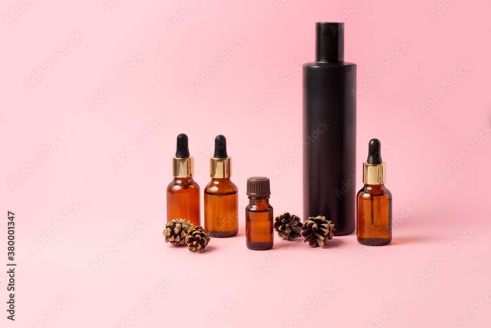 A set of amber bottles for essential oils and cosmetics. Glass bottle. Dropper, spray bottle A set of amber bottles for essential oils and cosmetics. Glass bottle. Dropper, spray bottle
