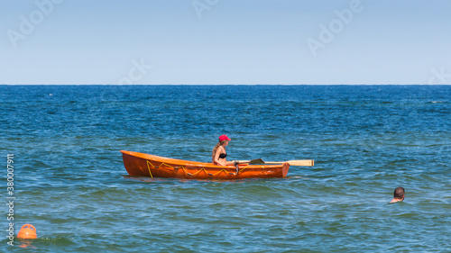 boat of water lifeguards on the beach on the Baltic in Łeba © Piotr